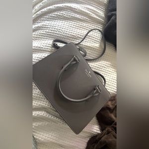 Kate spade big gray purse, never worn with tags, 4 pockets, 2 outer, 2 inner